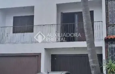 Casa com 3 quartos à venda na rua ângelo passuelo, 390, vila nova, porto alegre, 262 m2 por r$ 750.000