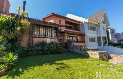 Casa em condomínio fechado com 3 quartos à venda na rua tocantins, 869, lomba do pinheiro, porto alegre, 336 m2 por r$ 2.000.000