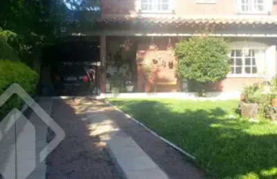 Casa em condomínio fechado com 3 quartos à venda na rua dos guenoas, 796, guarujá, porto alegre, 300 m2 por r$ 1.080.000