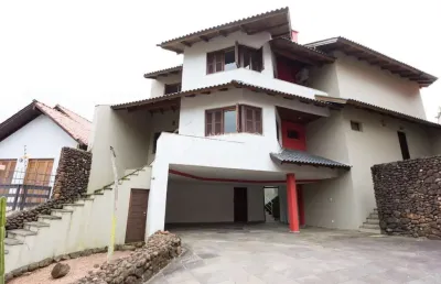 Casa em condomínio fechado com 4 quartos à venda na rua josé otávio manica, 230, santa tereza, porto alegre, 390 m2 por r$ 1.710.000