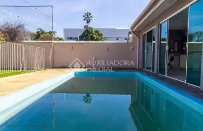 Casa em condomínio fechado com 4 quartos à venda na rua otávio faria, 6, teresópolis, porto alegre, 331 m2 por r$ 1.823.000