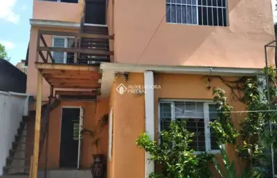 Casa com 4 quartos à venda na rua aldrovando leão, 85, vila jardim, porto alegre, 264 m2 por r$ 890.000