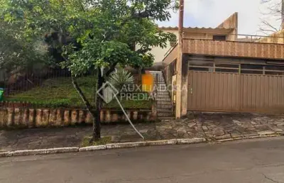 Casa em condomínio fechado com 4 quartos à venda na rua fernando osório, 230, teresópolis, porto alegre, 159 m2 por r$ 655.000