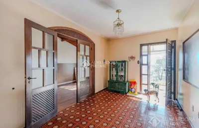 Casa com 4 quartos à venda na acesso das palmeiras, 100, santa tereza, porto alegre, 133 m2 por r$ 549.000