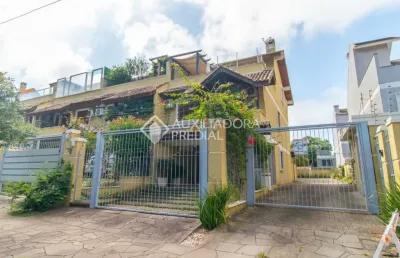 Casa em condomínio fechado com 3 quartos à venda na rua general rondon, 99, tristeza, porto alegre, 194 m2 por r$ 1.480.000