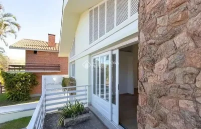 Casa com 3 quartos à venda na rua manauê, 76, vila assunção, porto alegre, 174 m2 por r$ 1.300.000