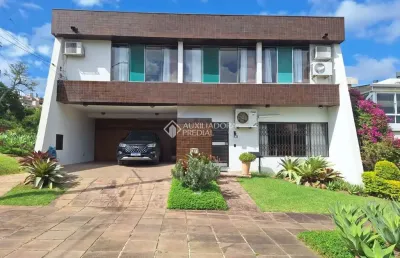 Casa em condomínio fechado com 3 quartos à venda na rua sinke, 236, santa tereza, porto alegre, 250 m2 por r$ 1.425.000