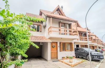 Casa em condomínio fechado com 3 quartos à venda na avenida orleaes, 105, guarujá, porto alegre, 207 m2 por r$ 650.000