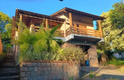Casa com 3 quartos à venda na avenida vicente monteggia, 2486, cavalhada, porto alegre, 1534 m2 por r$ 1.750.000