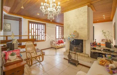 Casa com 4 quartos à venda na rua miguel tostes, 806, rio branco, porto alegre, 340 m2 por r$ 1.700.000