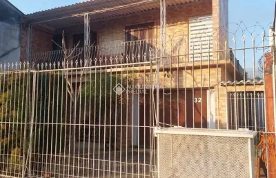 Casa com 5 quartos à venda na rua adroaldo novo correa, 32, cavalhada, porto alegre, 212 m2 por r$ 550.000