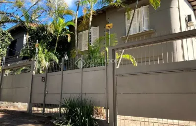 Casa em condomínio fechado com 4 quartos à venda na rua eudoro berlink, 222, auxiliadora, porto alegre, 240 m2 por r$ 2.350.000