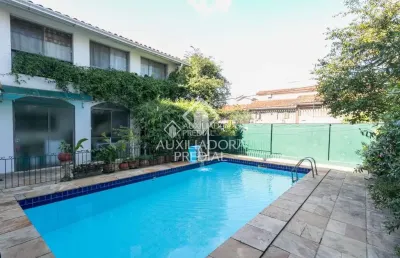 Casa com 4 quartos à venda na rua josé antônio aranha, 324, três figueiras, porto alegre, 241 m2 por r$ 2.000.000