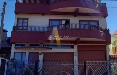 Casa com 5 quartos à venda na doutor joão beckel, 1055, hípico, camaquã, 576 m2 por r$ 1.700.000