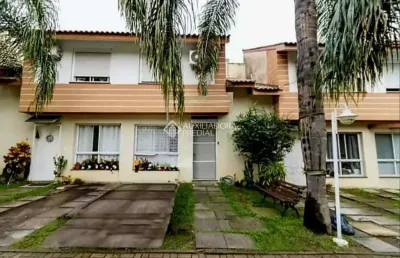 Casa em condomínio fechado com 3 quartos à venda na rua coronel josé rodrigues sobral, 421, partenon, porto alegre, 108 m2 por r$ 530.000