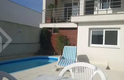 Casa em condomínio fechado com 4 quartos à venda na rua adriano pereira da silva, 290, vila nova, porto alegre, 320 m2 por r$ 1.250.000
