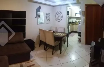 Casa em condomínio fechado com 2 quartos à venda na avenida guarujá, 126, guarujá, porto alegre, 105 m2 por r$ 360.000