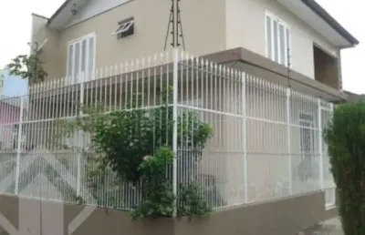 Casa em condomínio fechado com 5 quartos à venda na rua carmense, 234, rubem berta, porto alegre, 250 m2 por r$ 949.900