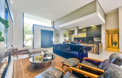 Casa em condomínio fechado com 4 quartos à venda na avenida juca batista, 8000, chapéu do sol, porto alegre, 418 m2 por r$ 3.590.000