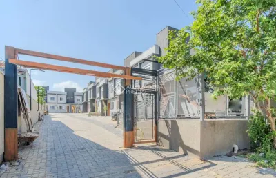 Casa em condomínio fechado com 2 quartos à venda na rua miguel ascoleze, 125, vila nova, porto alegre, 60 m2 por r$ 289.000