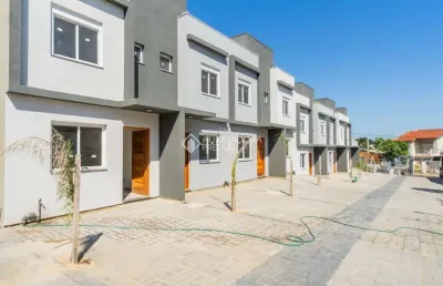 Casa em condomínio fechado com 2 quartos à venda na rua miguel ascoleze, 125, vila nova, porto alegre, 60 m2 por r$ 319.000