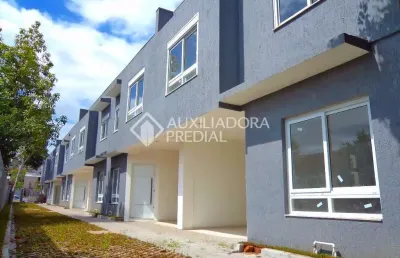 Casa em condomínio fechado com 3 quartos à venda na rua doutor mário totta, 2430, tristeza, porto alegre, 114 m2 por r$ 580.000
