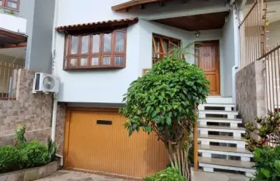 Casa com 3 quartos à venda na rua professor isidoro la porta, 106, jardim itu sabará, porto alegre, 308 m2 por r$ 1.250.000