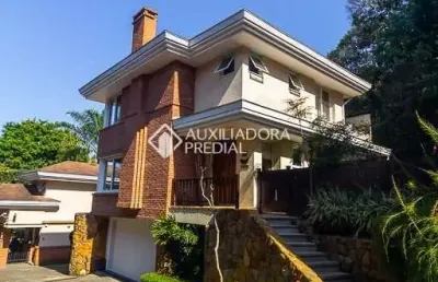 Casa em condomínio fechado com 3 quartos à venda na avenida coronel marcos, 760, pedra redonda, porto alegre, 370 m2 por r$ 2.100.000