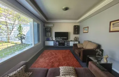Casa em condomínio fechado com 4 quartos à venda na rua professor clemente pinto, 159, medianeira, porto alegre, 248 m2 por r$ 930.000