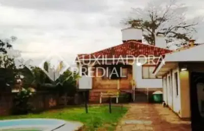 Casa em condomínio fechado com 3 quartos à venda na rua marquês do maricá, 168, vila nova, porto alegre, 605 m2 por r$ 750.000