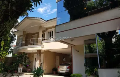Casa com 2 quartos à venda na rua fernando abbott, 1062, cristo redentor, porto alegre, 565 m2 por r$ 2.600.000
