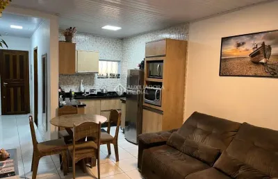 Casa com 2 quartos à venda na biguá, 342, jardim algarve, alvorada, 175 m2 por r$ 350.000