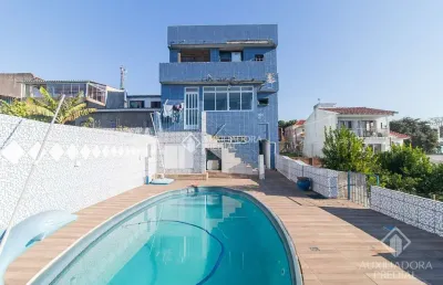 Casa com 3 quartos à venda na rua sílvio romero, 38, partenon, porto alegre, 381 m2 por r$ 920.000