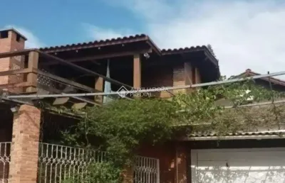Casa com 3 quartos à venda na rua alceu soares de lima, 105, parque santa fé, porto alegre, 300 m2 por r$ 480.000
