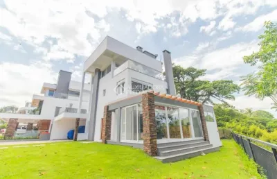 Casa em condomínio fechado com 3 quartos para alugar na avenida coronel marcos, 1239, pedra redonda, porto alegre, 335 m2 por r$ 29.900
