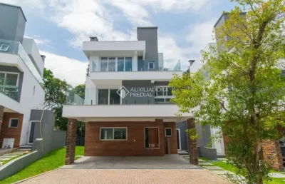 Casa em condomínio fechado com 3 quartos para alugar na avenida coronel marcos, 1239, pedra redonda, porto alegre, 300 m2 por r$ 18.000