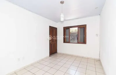Casa em condomínio fechado com 2 quartos para alugar na rua capitão pedroso, 801, restinga, porto alegre, 100 m2 por r$ 1.800