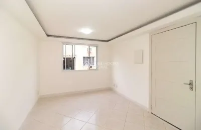 Casa em condomínio fechado com 2 quartos para alugar na avenida josé aloísio filho, 965, humaitá, porto alegre, 100 m2 por r$ 1.990