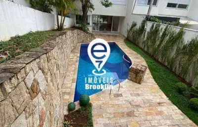 Casa de condomínio de 425 m² com 4 suítes e 7 banheiros 4 vagas à venda,