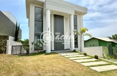 Casa de condomínio 4/4 nascente à venda no alphaville litoral norte 2