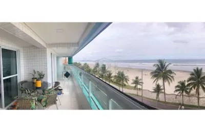 Apartamento 2 dorm - varanda gourmet - pé na areia e vista mar- jardim real - pg