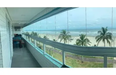 Apartamento 2 dorm - varanda gourmet - pé na areia e vista mar- jardim real - pg