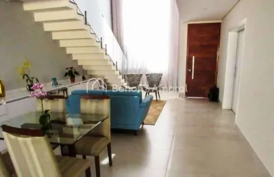 Casa à venda em condomínio em paulínia,sobrado,3 suítes,lavabo, escritório, living 2 ambientes com pé direito alto, sancas, área gourmet, 4 vagas