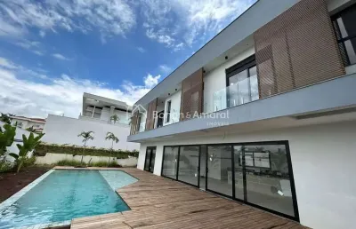 Linda casa de alto padrão com sofisticação e elegância no condomínio mont blanc