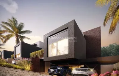 Casa em condomínio com 3 suítes, sala dois ambientes, 5 banheiros e 2 vagas na garagem - unidade 1