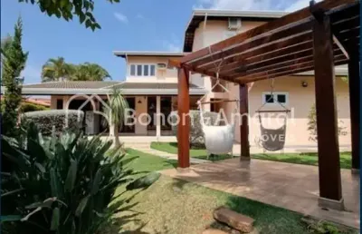 Casa de condomínio com 4 quartos e 5 banheiros, 4 vagas de garagem à venda