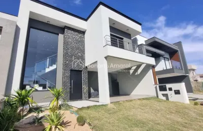 Casa em condomínio à venda, com 4 suítes (1 térrea), 198 m² de área construída