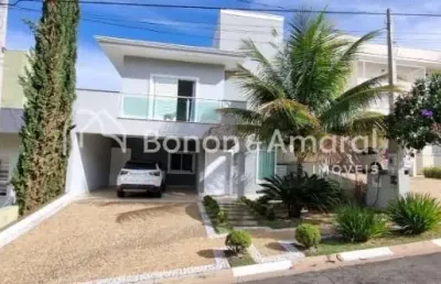 Bela casa em condomínio, com 3 suítes e piscina aquecida, por r$ 1.590.000,00