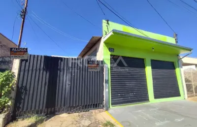 Espaçosa casa comercial com 4 dormitórios e um salão na frente no parque santa felícia jardim