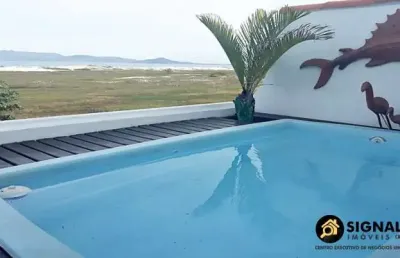 Venda linda casa triplex frente a praia no braga cabo frio